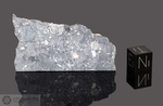 DAR AL GANI 400 - Recuperata il 10 Marzo 1998, Dar Al Gani, Deserto libico, Libia. Achondrite Breccia Lunare anorthositica. Massa totale recuperata 1425 grammi. Pezzo in collezione: fetta gr.3 (McM041)