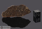 DAR AL GANI 521 - Recuperata nel 1998, Dar Al Gani, Deserto libico, Libia. Chondrite Carbonacea CV3. Massa totale recuperata 1567 grammi. Pezzo in collezione: fine pezzo gr.9.4 (McM050)