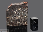 BARRATTA - Recuperata nel 1845, Deniliquin, Contea Townsend, New South Wales, Australia. Chondrite L3.8 nera. Massa totale recuperata 203 kg. Pezzo in collezione: fetta gr.25.29 (McM549)