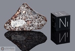 NWA 1260 - Recuperata nel 2002, Erfoud, Marocco, Africa. Chondrite L3.8/L6 Breccia. Massa totale recuperata 2518 grammi. Pezzo in collezione: fetta con inclusione gr.2.9 (McM474)