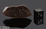 DAR AL GANI 749 - Recuperata nell’Ottobre 1999, Dar Al Gani, Deserto libico, Libia. Chondrite Carbonacea CO3. Massa totale 95 kg. Pezzo in collezione: fetta gr.4 (McM063)